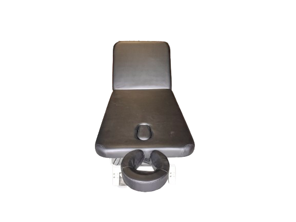 Top-down close-up view of the contoured headrest section on the 2-section electric facial massage table, featuring a built-in face hole for optimal client comfort during prone treatments.