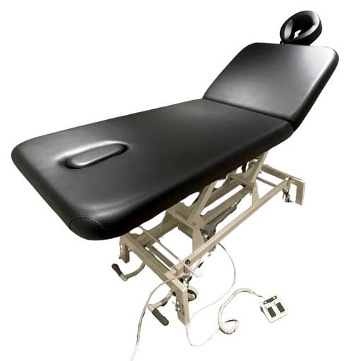Black massage table with adjustable base on a white background