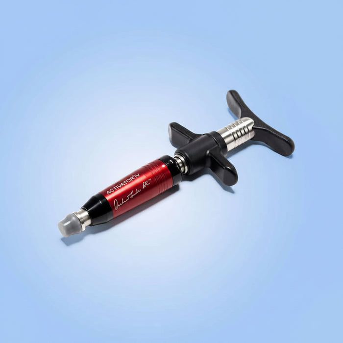 A front-angled view of the ACTIVATOR IV chiropractic instrument with a red finish, highlighting the latest design in the manual instrument series.