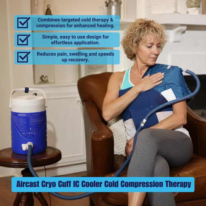 A user standing while wearing the Aircast shoulder cuff connected to the IC cooler, demonstrating the system's ease of use during rehabilitation.