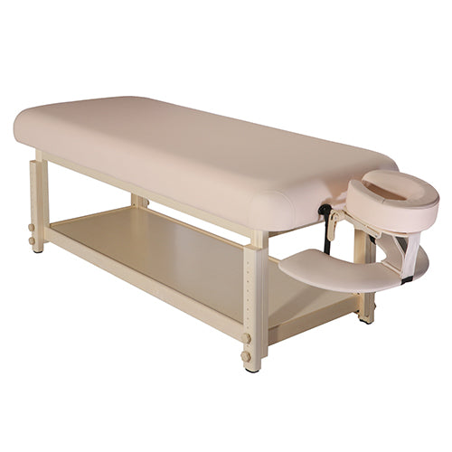 Archer stationary massage table flat package in beige upholstery with face cradle and bottom storage shelf, from Therapy Supply