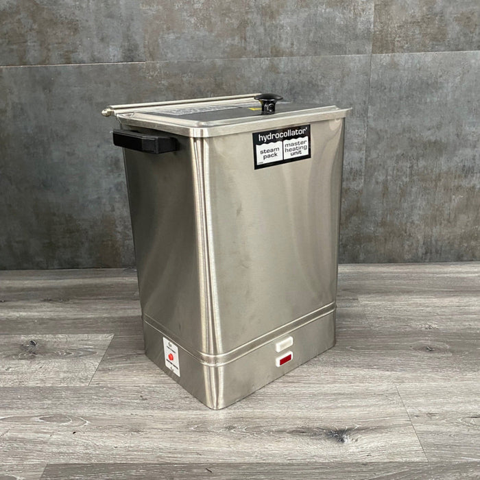 An angled side profile of the stationary E-1 Hydrocollator, showcasing its durable design and external temperature control indicator.