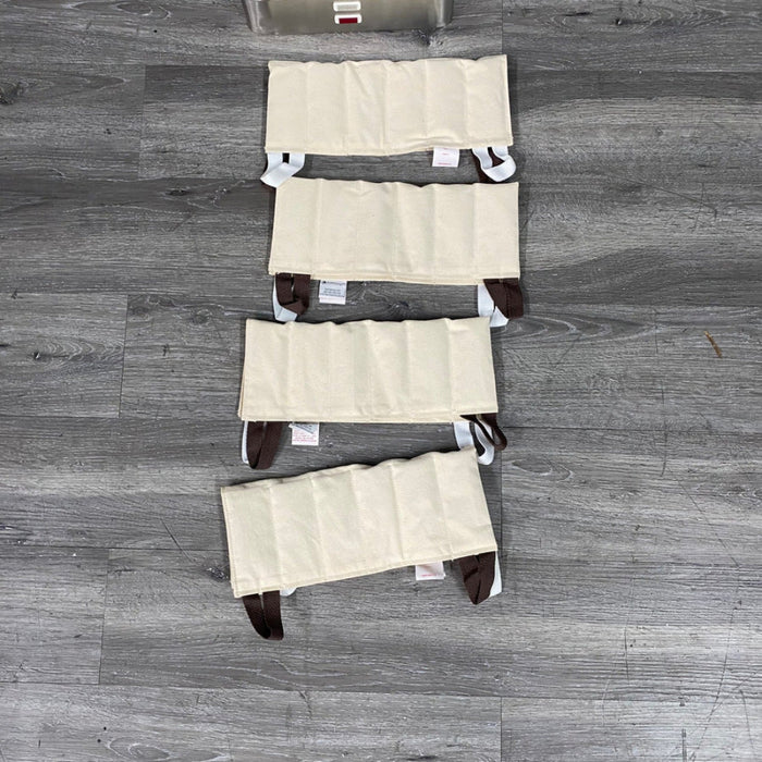 A technical view of the 4 standard size hot packs included with the E-1 heating unit, designed for dependable moist heat therapy.