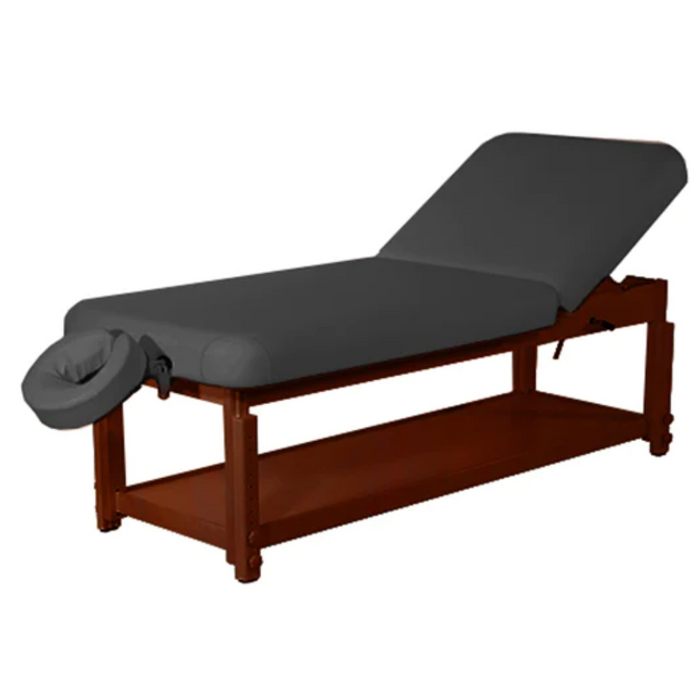 Angled standalone view of the black ET Series 30-inch Tilt Stationary Massage Table, featuring a durable European beech wood frame and an adjustable backrest designed for professional clinical use.