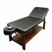 An angled profile shot of the ET Series table with the backrest in an elevated position, highlighting the stability of the stationary design for clinical use.