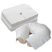 Stack of white luxurious disposable face cradle covers for massage tables shown with a face rest cushion
