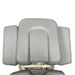 Gray padded face cradle cushion set with three rectangular pads for a massage or treatment table