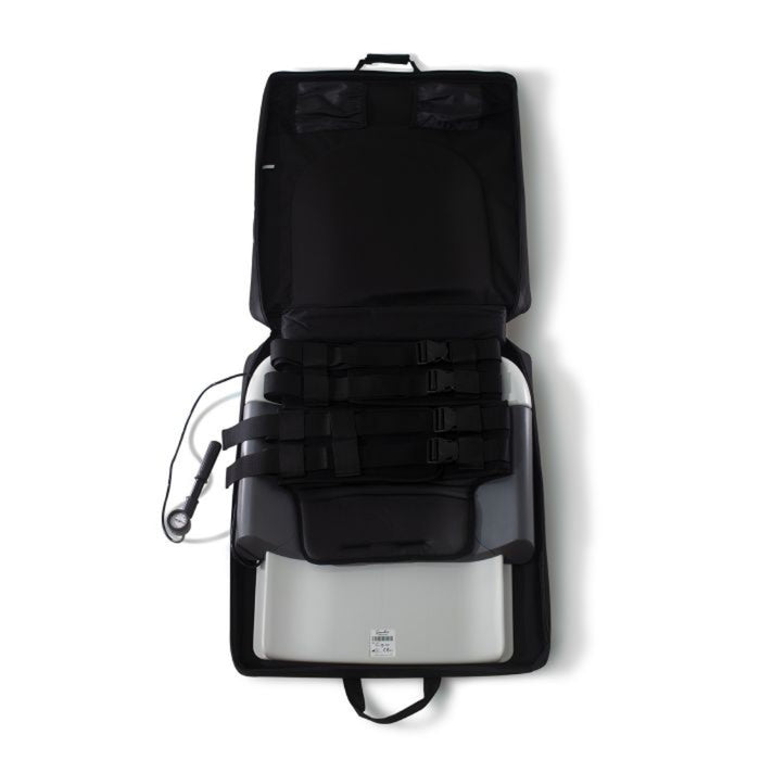 A vertical profile view of the Saunders Lumbar unit, showcasing its streamlined construction and ease of setup for clinical-style treatment outside the clinic.