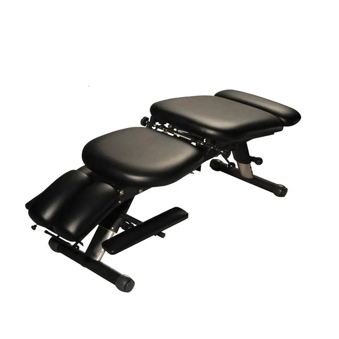 An angled side profile of the Series 260 stationary chiropractic table, illustrating the full 127.5 lb build and stationary design.