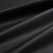 A view of the smooth, professional black finish of the fitted PU vinyl cover, designed to extend the life of massage table upholstery.