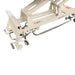 Walk-free base treatment table frame showing the cream colored lifting mechanism, foot pedals, and underside design, from Therapy Supply