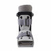 Straight-on front view of the Aircast AirSelect Short Walking Boot, showcasing its adjustable strap system and rigid front panel engineered for customized patient fit and protection.