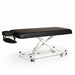 Angled standalone view of the black Athena Classic Electronic Massage Table, featuring a heavy-duty steel scissor-lift frame and lockable wheels designed for professional clinic environments.