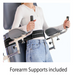 Action shot of a model using the included padded forearm supports with vertical hand grips on the BF Series tilt table, providing upper body stability during vertical treatment.