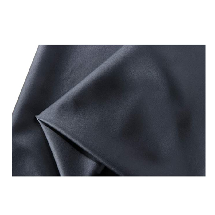 Close-up texture detail of the high-quality, easy-to-clean black PU vinyl material used in the universal massage table protection cover.