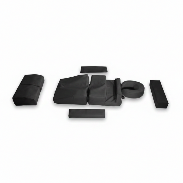 Standalone view of the black Body Positioning Pregnancy Therapy Cushion, a multi-piece bolster package featuring specific cutouts designed to provide ultimate comfort and reduce pressure for pregnant and postpartum patients.
