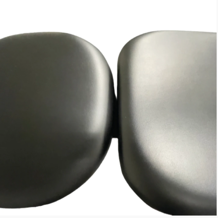 Close-up detail of the durable upholstery and the tight, seamless meeting point between two drop section cushions on the Series Stationary Chiropractic Drop Table 260.