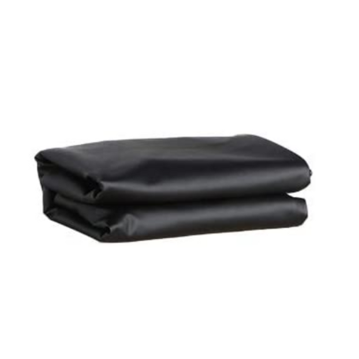 Standalone view of the black PU vinyl massage table protection cover neatly folded, highlighting its practical, lightweight design for easy storage.
