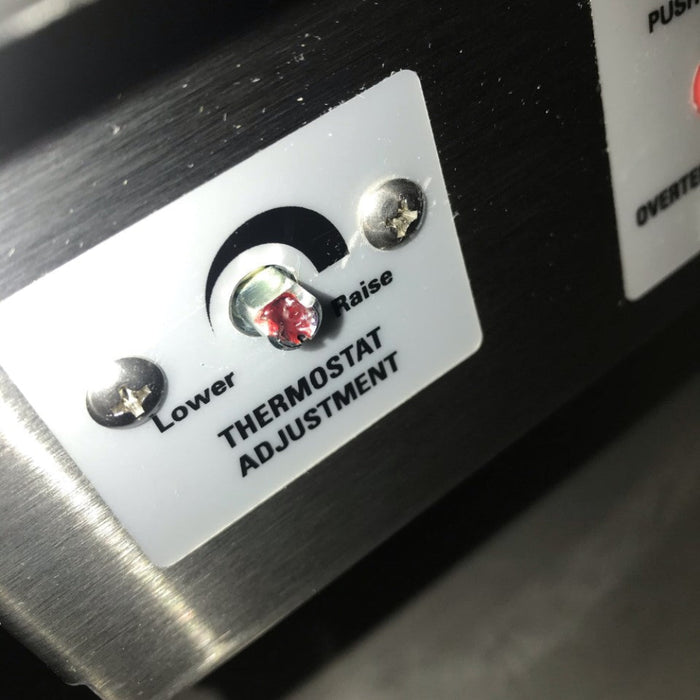 Close-up detail of the front panel and thermostatic temperature control area on the professional-grade Hydrocollator SS-2 mobile therapy unit.