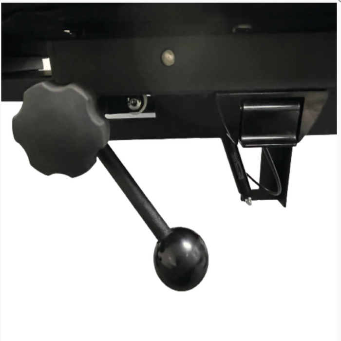 Close-up view underneath the Stationary Chiropractic Drop Table 260 showing the sturdy cocking handle mechanism used to smoothly engage the table's professional drop sections.