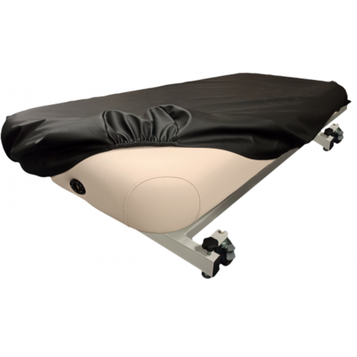 Close-up view of the black Universal Fitted PU Vinyl Protection Cover stretching over a portable massage table, showcasing its elastic corners designed for a secure, custom-like fit.